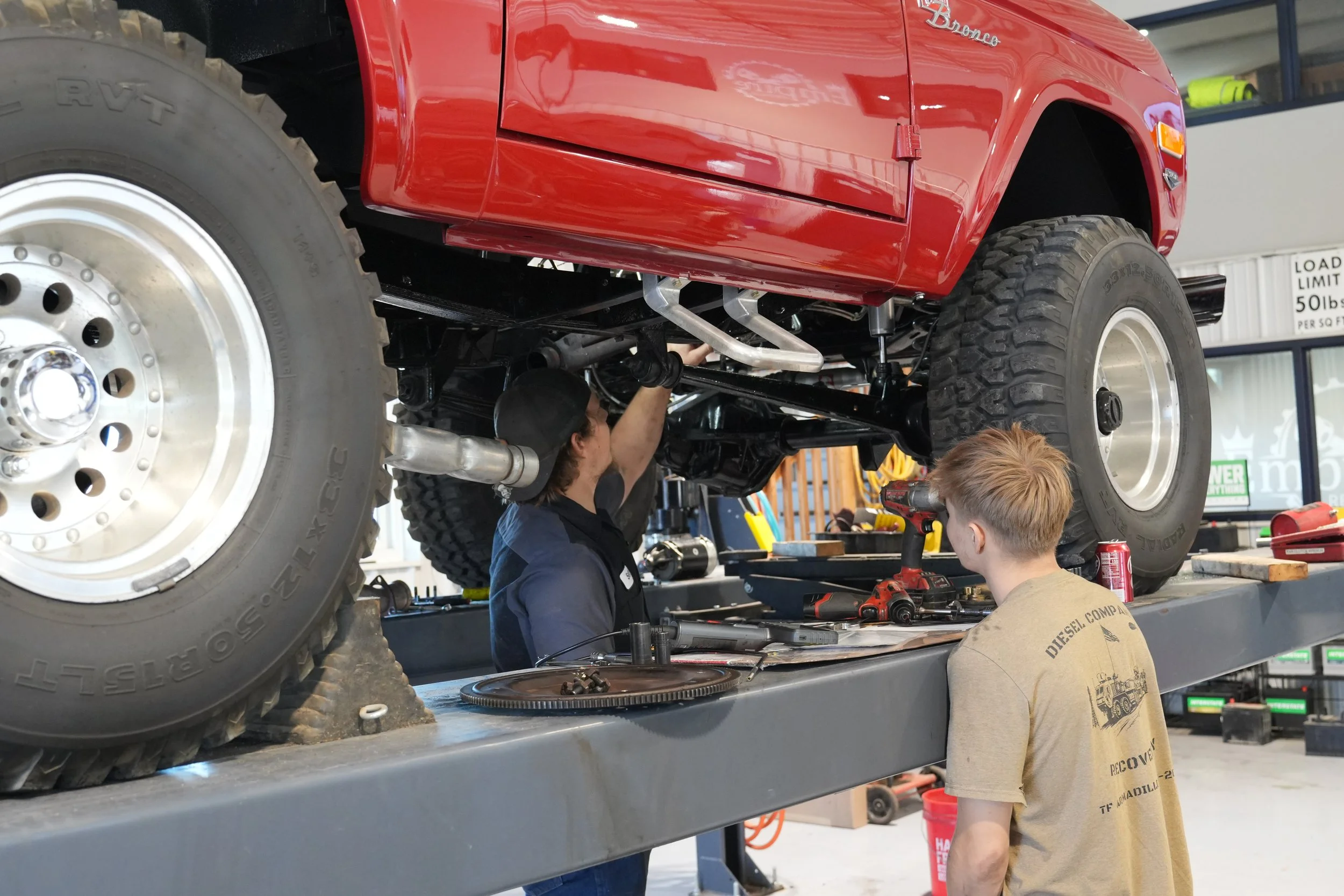 Truck repair and undercarriage inspection at Empire Auto Repair shop in Waverly, Nebraska