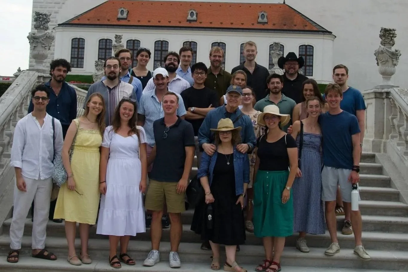 AJ Gubash with fellow participants at the Free Society Seminar in Slovakia, August 2026, posing for a group photograph outside a historic building.