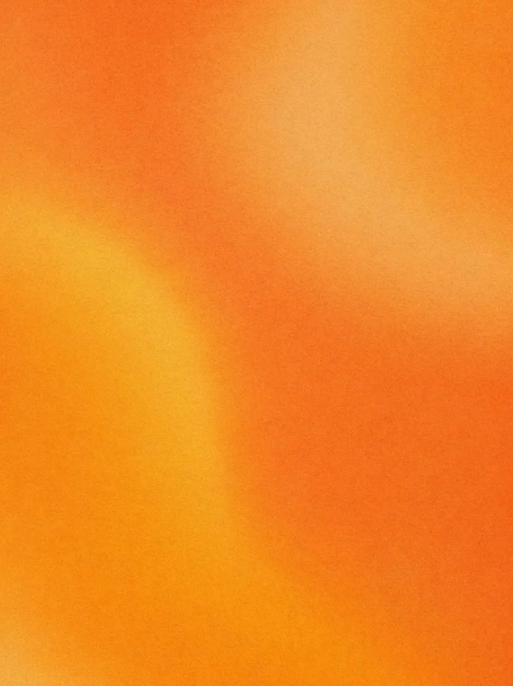 A close-up of an orange and red surface with no distinguishable objects.
