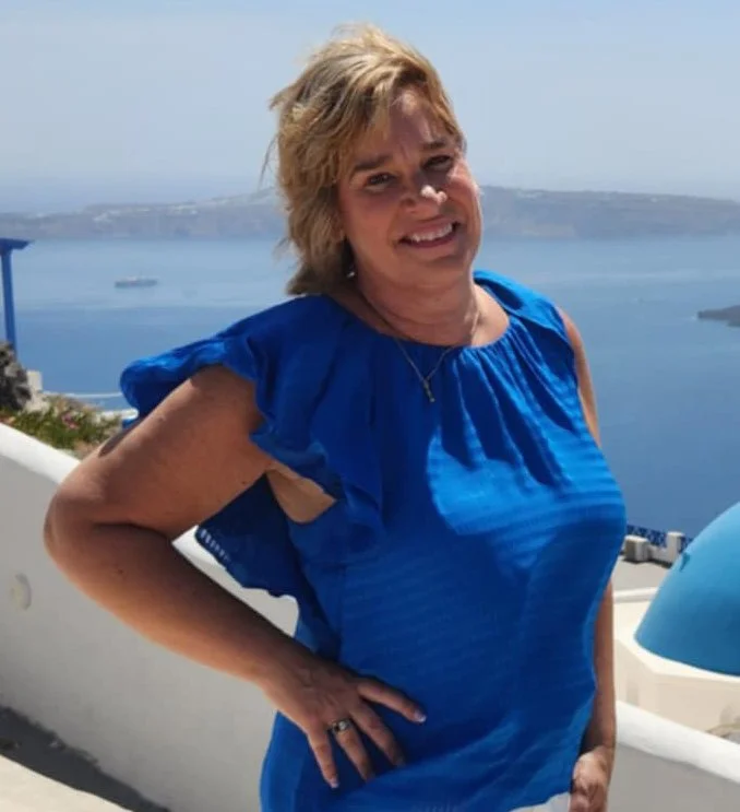 Brenda Roberts smiling with ocean in the background