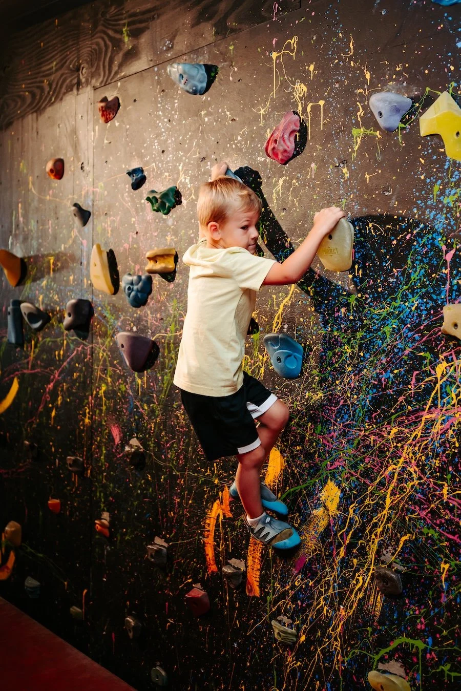 Kid climbing at Rise Up