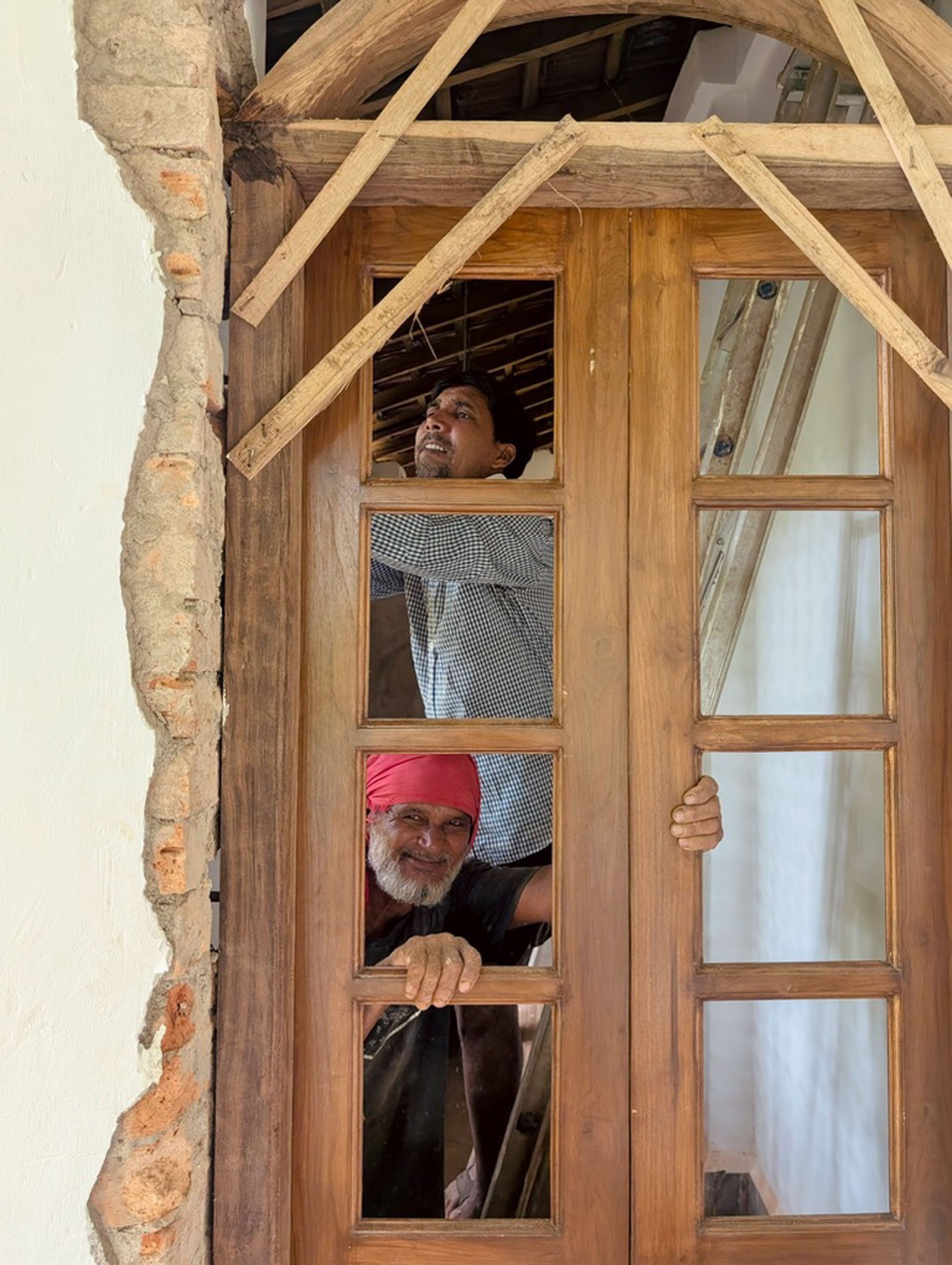   Fresh doors made of local teak wood by beautiful men  