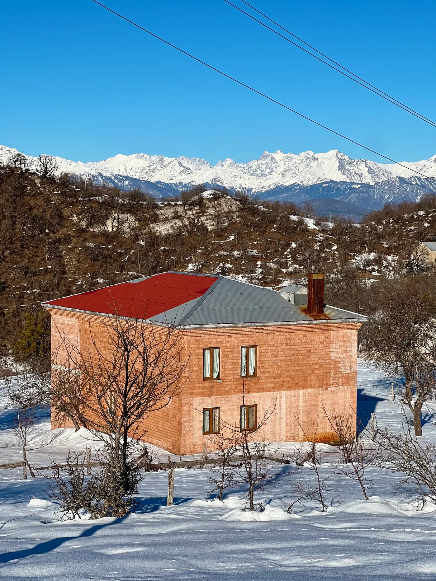   The home of Avto’s late brother, visible from the front yard.  