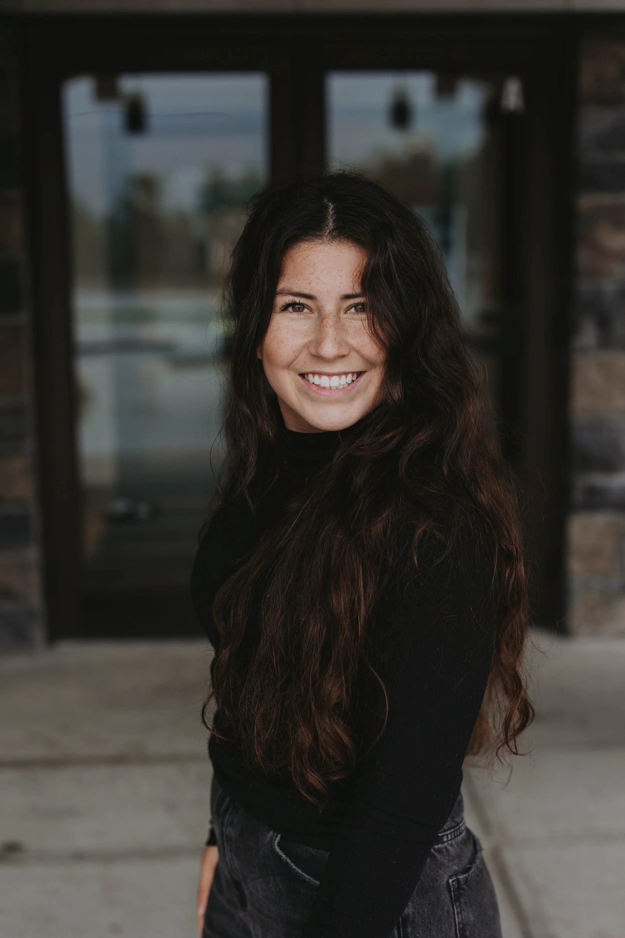 Portrait of Pocket Sunshine Photography founder Darrian, an Okanagan photographer based in Vernon, British Columbia.