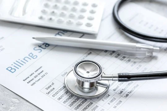 Medical billing professional reviewing healthcare billing information