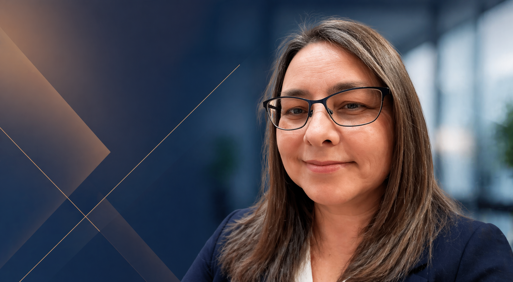 A woman with glasses smiling in a professional setting with a blurred modern building in the background.