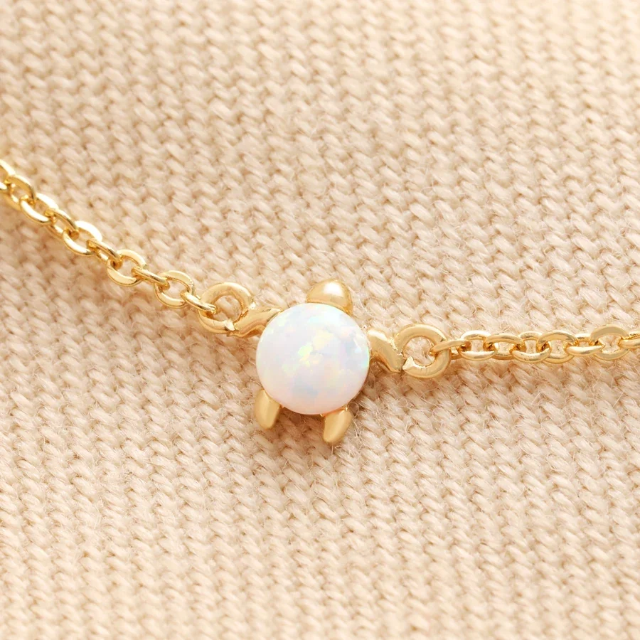 opal-turtle-charm-bracelet-gold-4x3a9222-900x900.webp