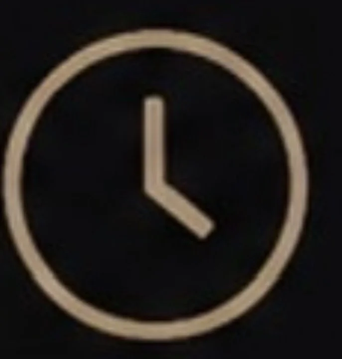 Analog clock showing 3:00