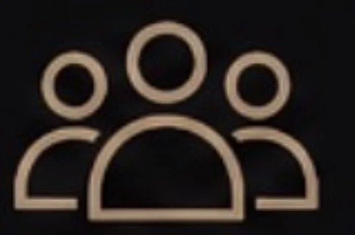 Icon of three stylized people, representing a group or community.