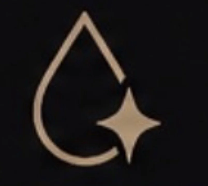 A gold and black nail polish logo featuring a stylized water droplet with a star inside it.