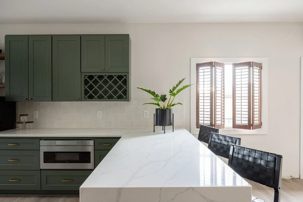 kitchen-remodel-waterfall-edge-quartz-counters-green-cabinets-washington.jpg