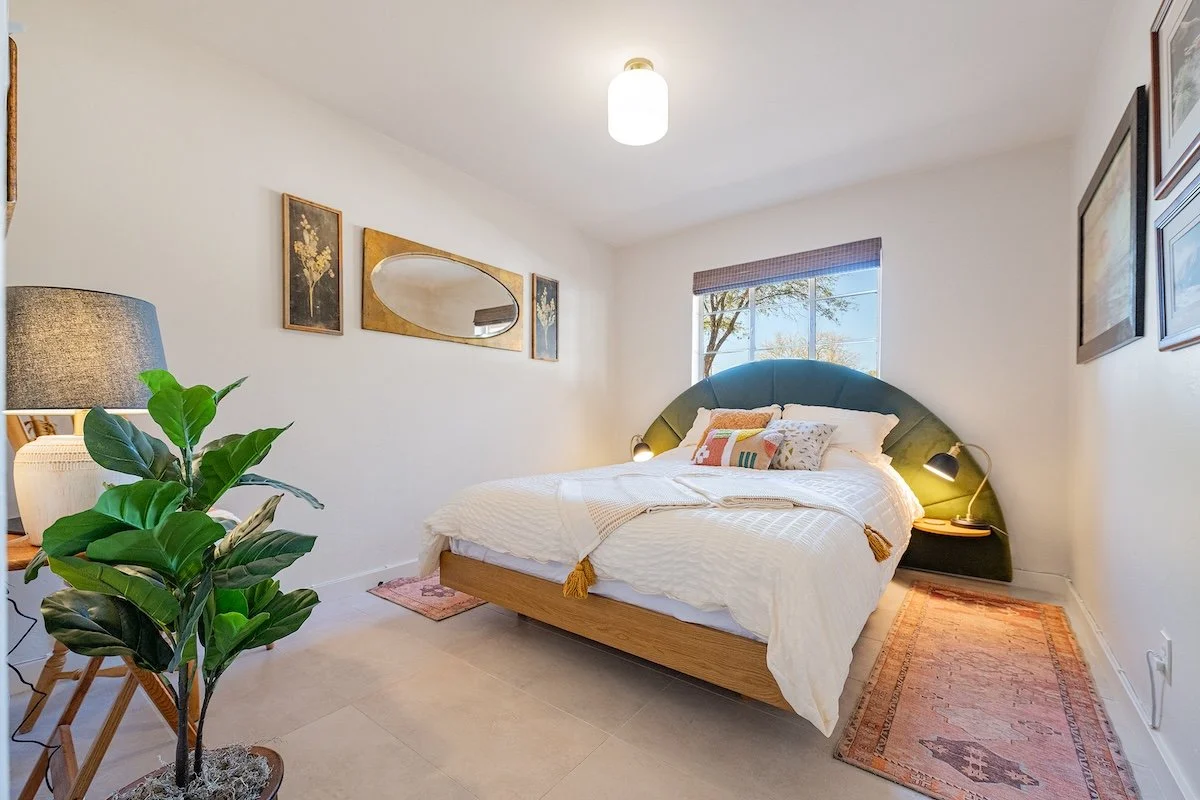 short-term-rental-bedroom-arched-headboard.jpeg
