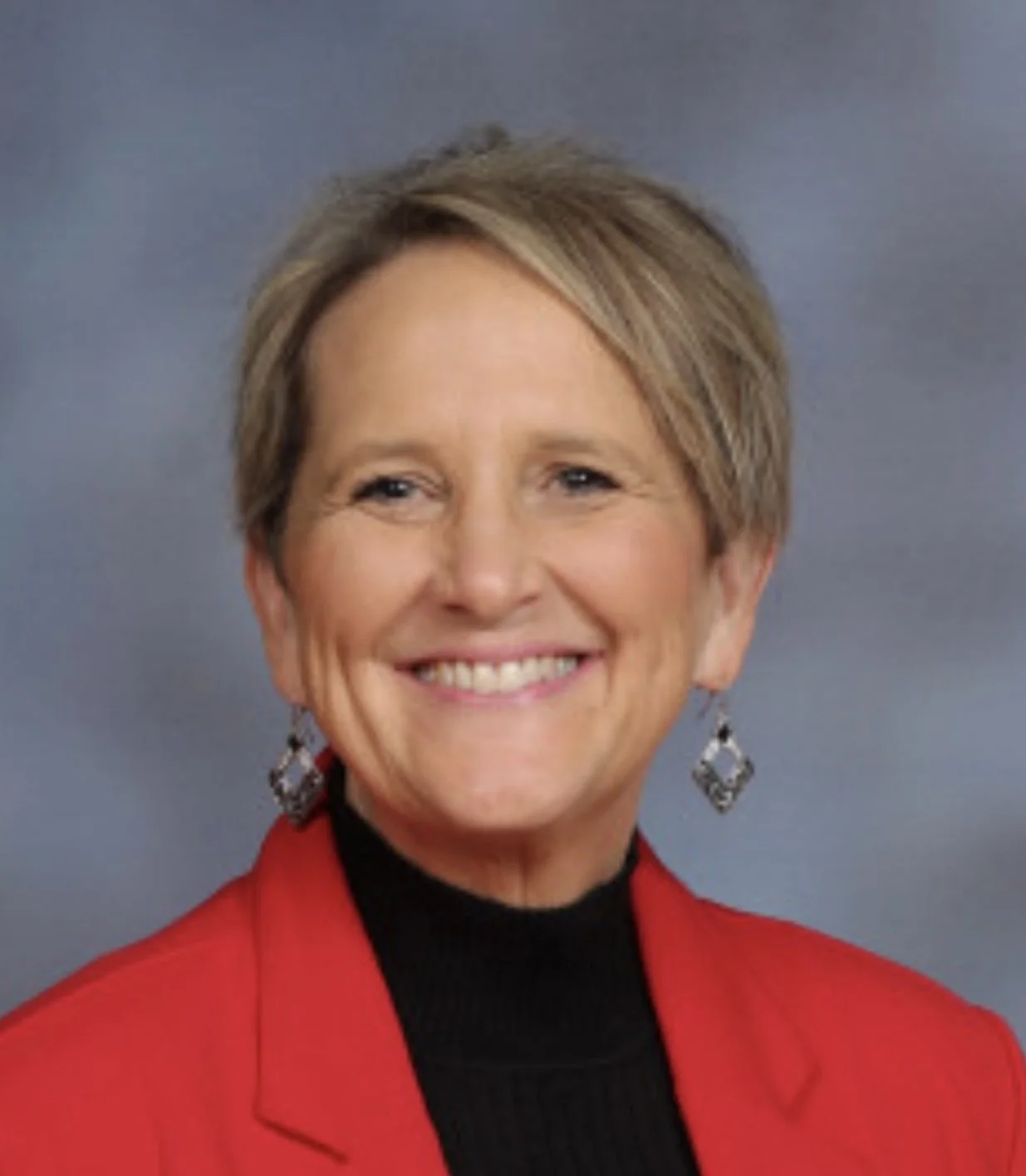 Professional headshot of Dr. Brenda L. Bennett, educational and organizational systems strategist.