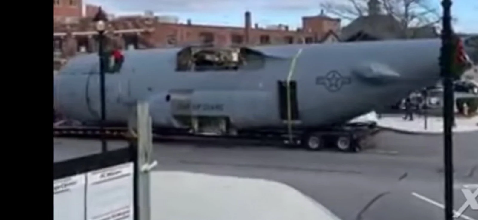 Military vehicle transported safely on RGN trailer – Prime Load Solutions best rates USA