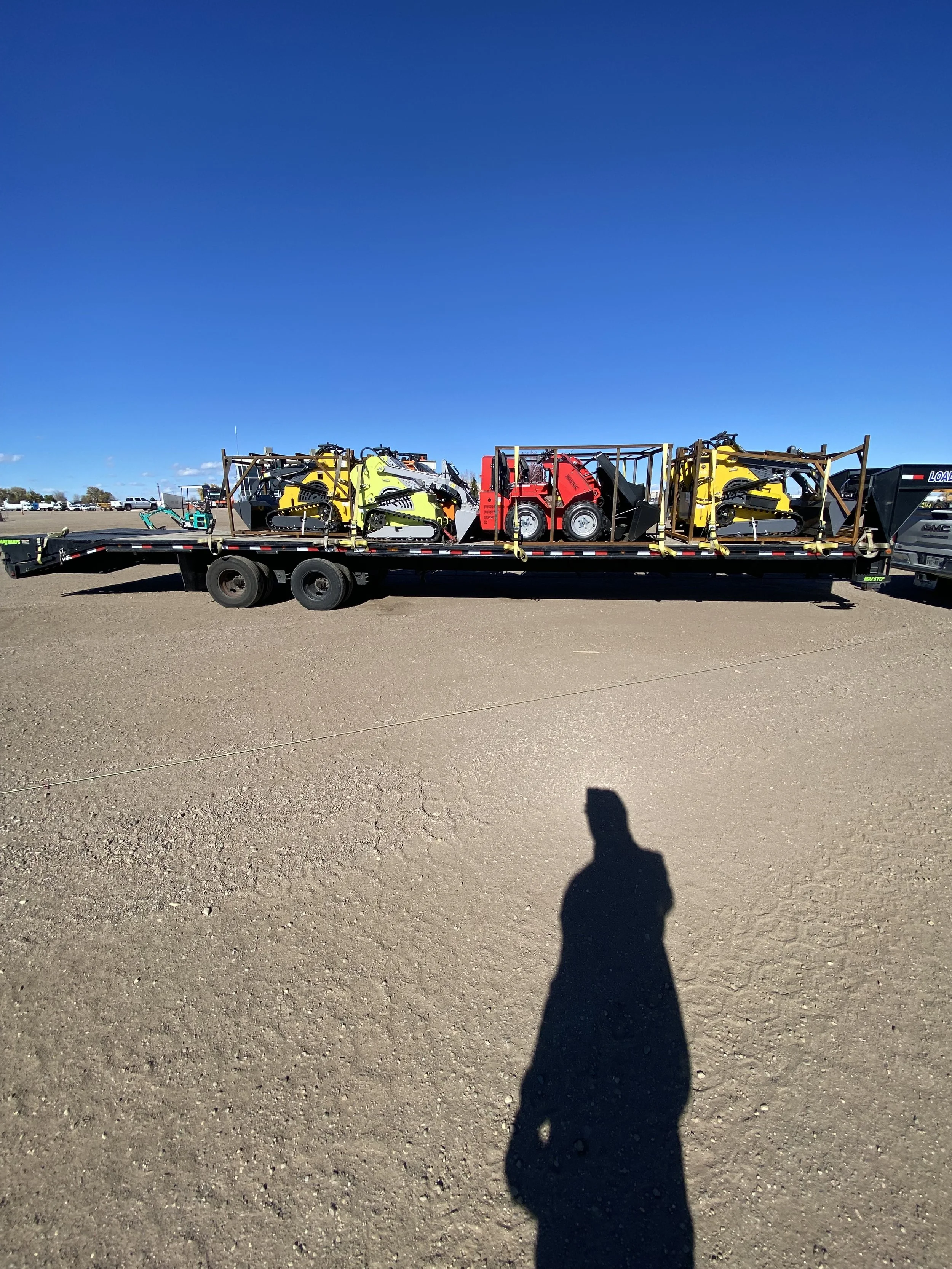 Mini Excavator equipment transport on flatbed trailer across 48 states – Prime Load Solutions LLC