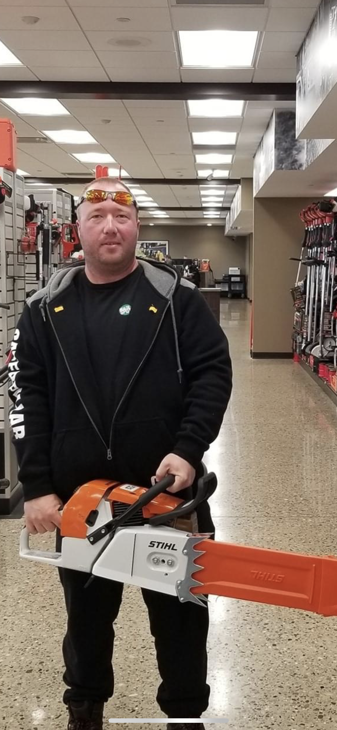 Ryan with his new chainsaw