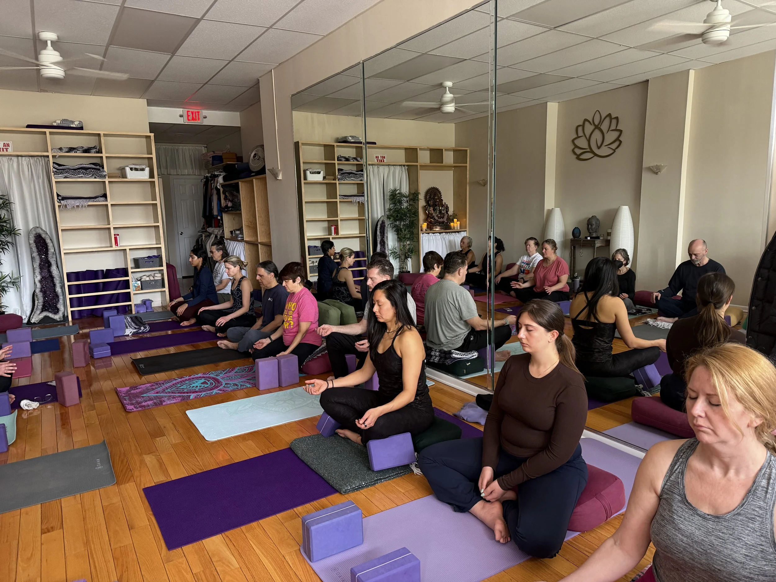 A community yoga practice in Malverne, NY at Peaceful Yoga Studio