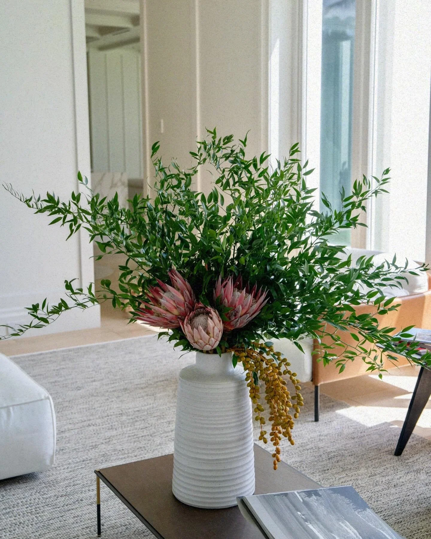 Elegant Italian ruscus, super king proteas in full bloom, and a playful cascade of dates. Refined, natural, bespoke.
Available for homes, hotels, and events in Miami &mdash; DM to book.​​​​​​​​​​​​​​​​