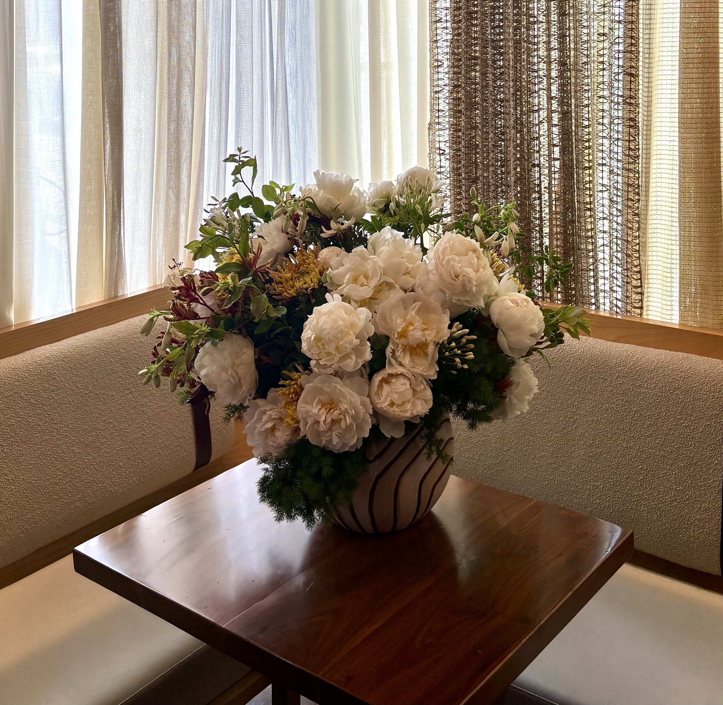 An event for House of Suntory's High Ball week in Miami located at Uchi Miami. The inspiration were the colors of the Toki bird and the amber tones of the whisky. The floral selection is inspired by the Japanese woodblock prints: Peonies, Lilies, Bar