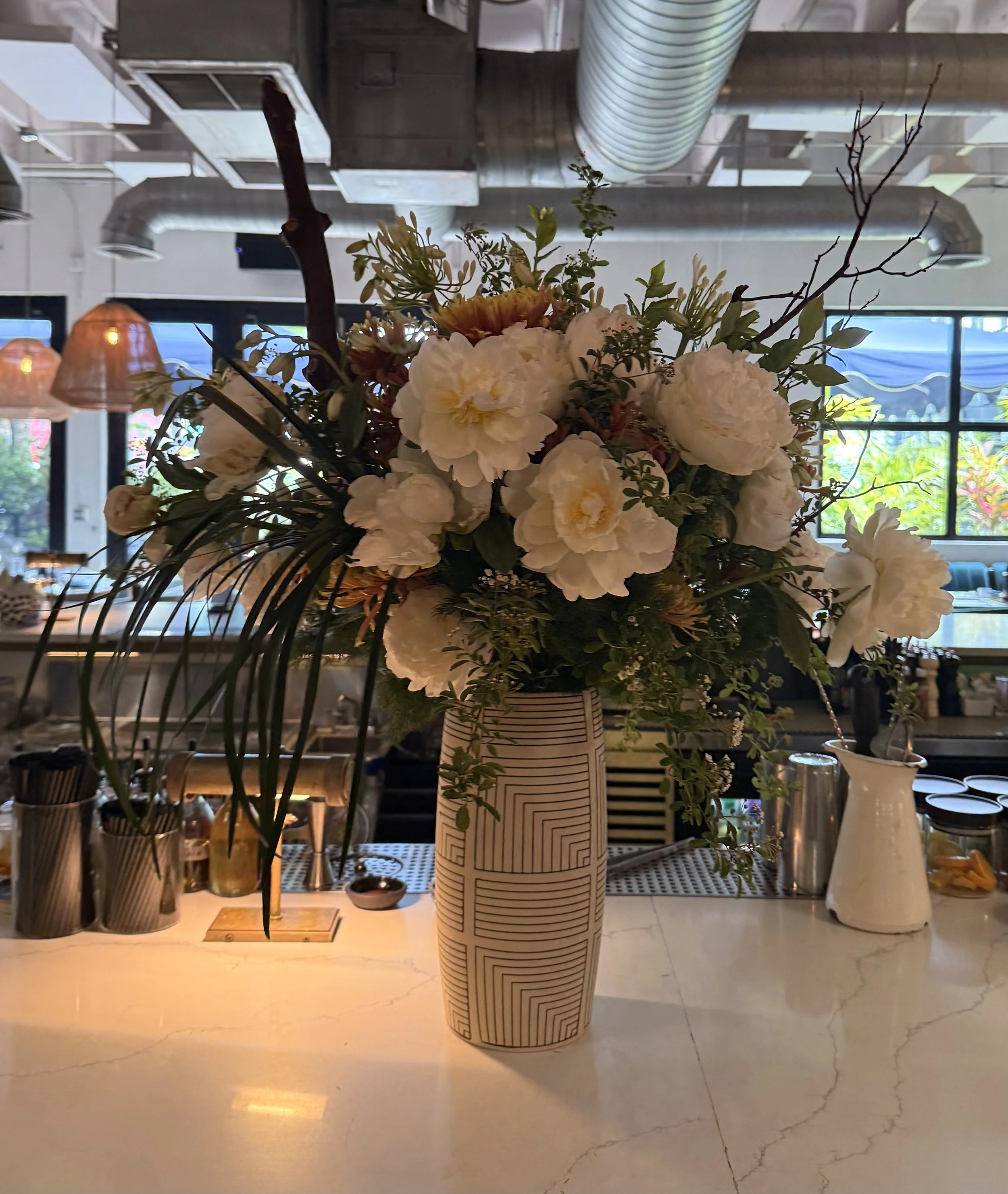 An event for House of Suntory's High Ball week in Miami located at Doya Miami. The inspiration were the colors of the Toki bird and the amber tones of the whisky. The floral selection is inspired by the Japanese woodblock prints: Peonies, Lilies, Bar