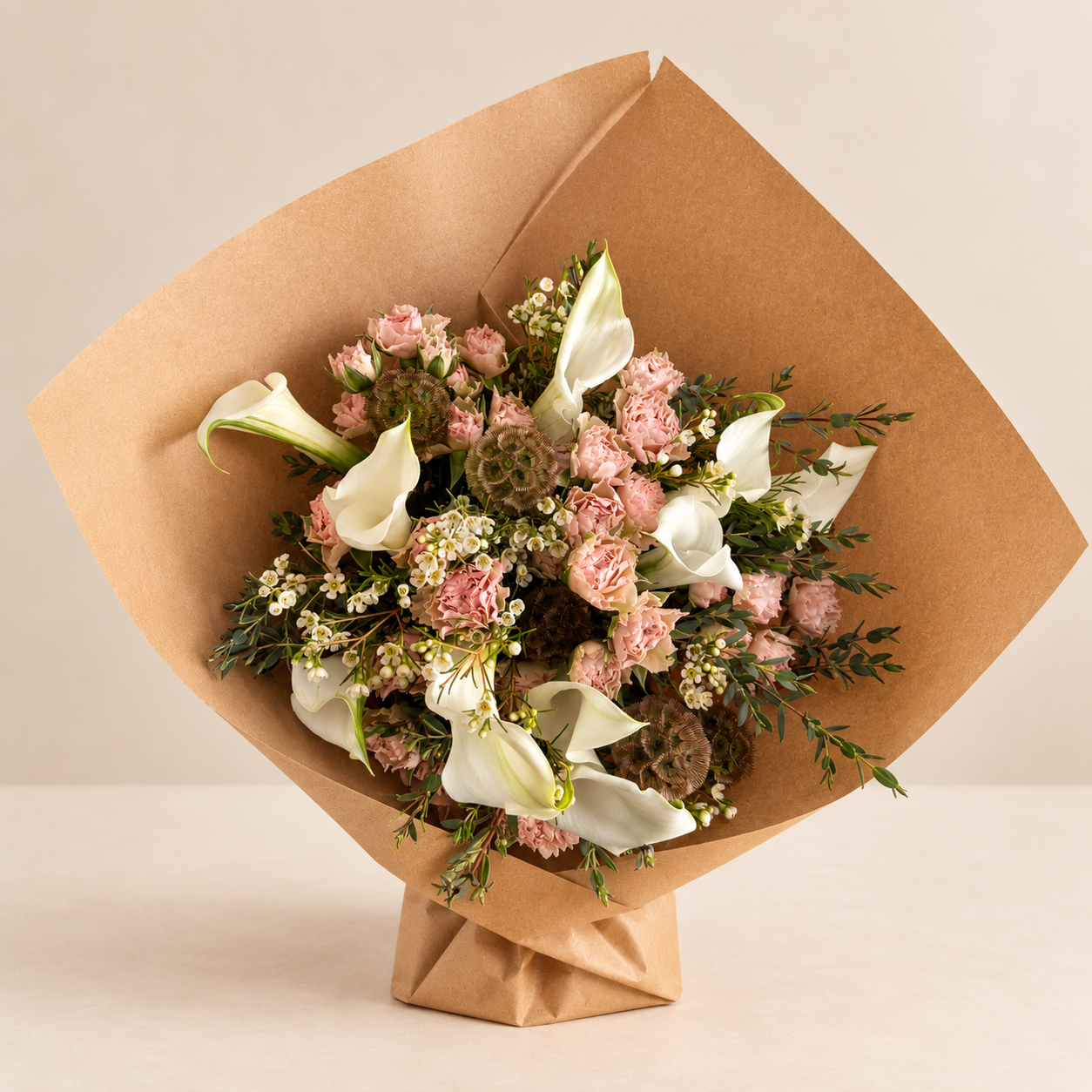 Dearest Darling romantic blush and white hand-tied bouquet by Grove Floral Studios in Miami