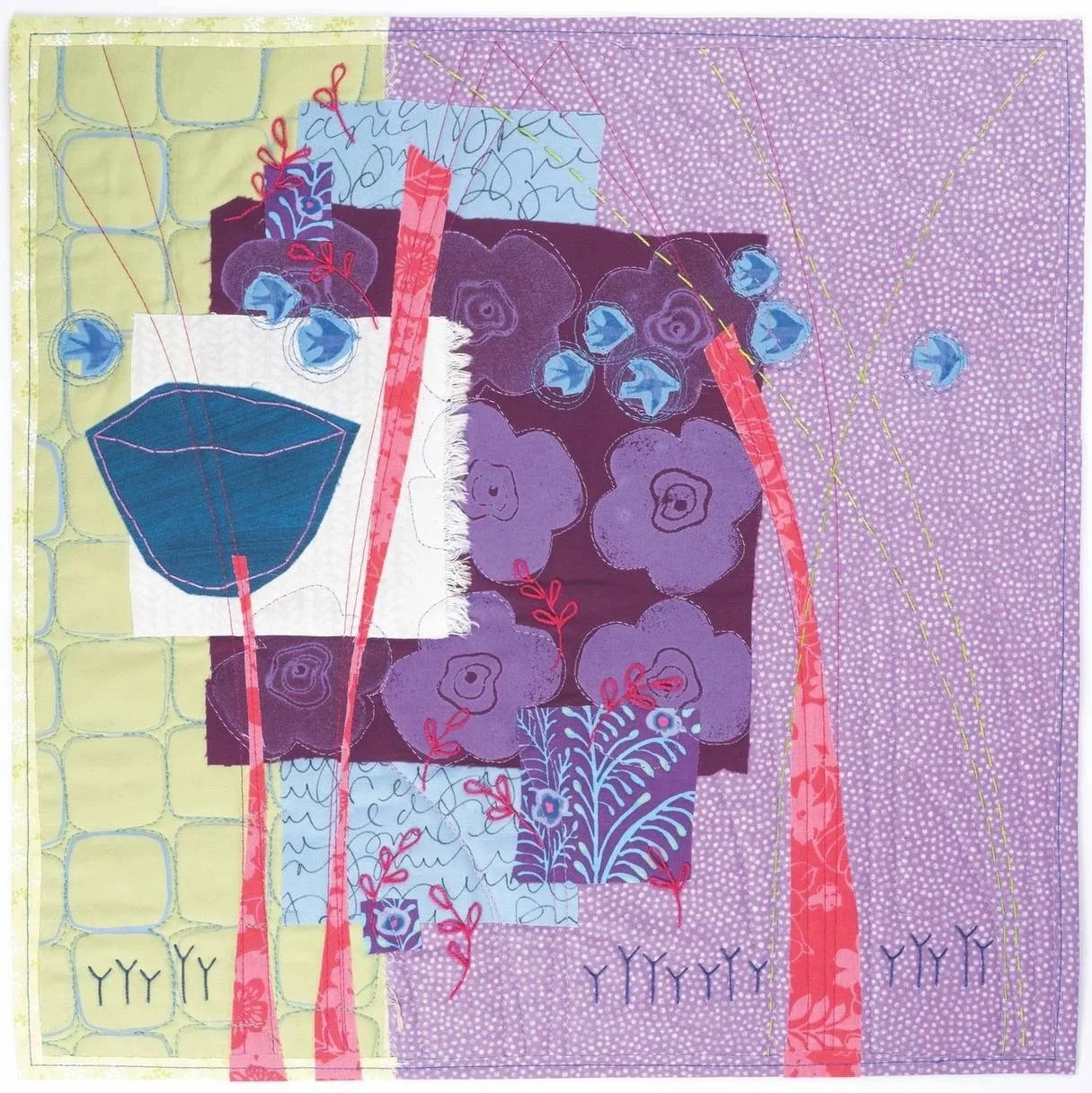 Abstract quilt with floral and geometric patterns in shades of purple, pink, light blue, yellow, and white, featuring stitched lines and embroidered details.