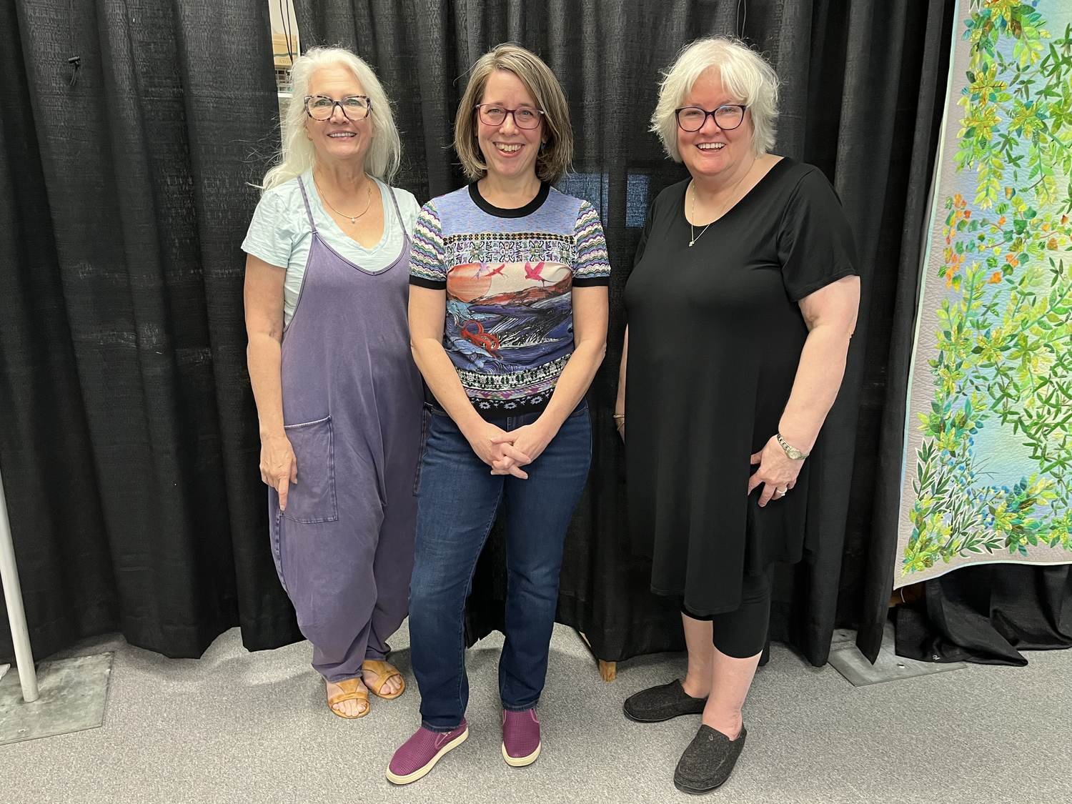 Deborah Boschert with her two fellow judges at the International Quilt Festival.