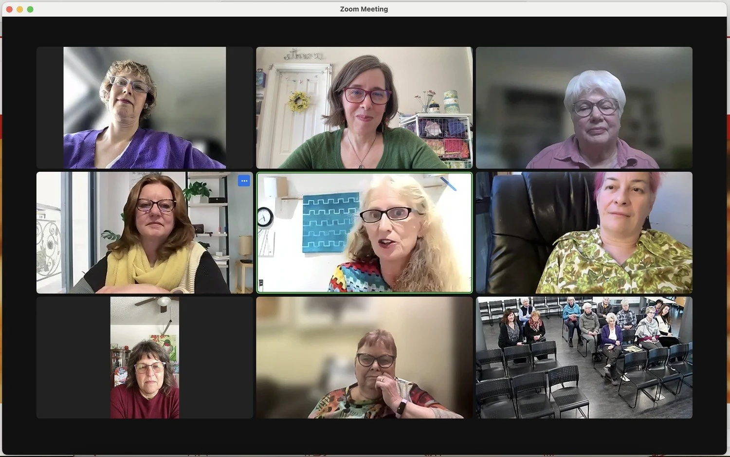 Members of the Twelve by Twelve international art quilt group meeting on Zoom.