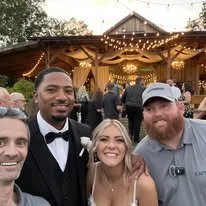 Kaptured Videography team and wedding couple at Amity Creek Farms in Granite Falls NC