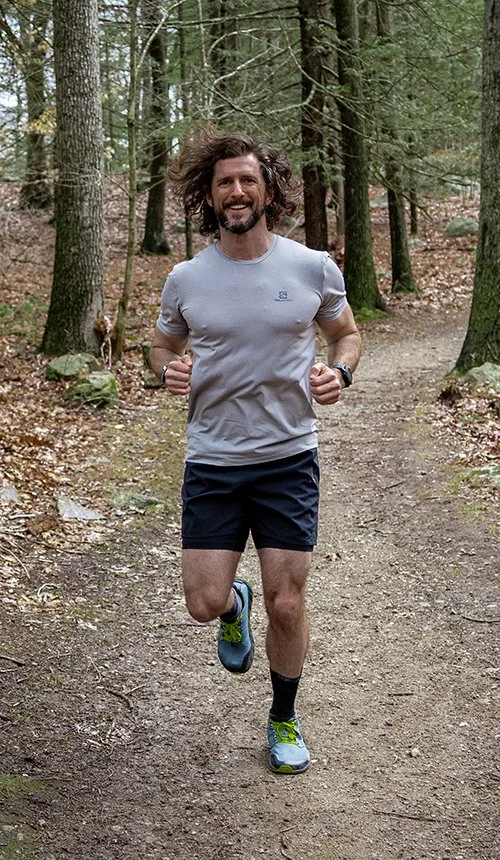 Brendan O'Hara trail running in the woods  — founder of Middle Men and host of the Middle Men Podcast