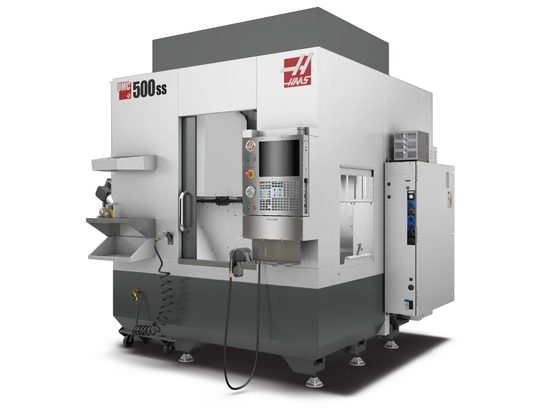 Industrial machine labeled 'Haas UMC 500ss' with a control panel and various mechanical components.