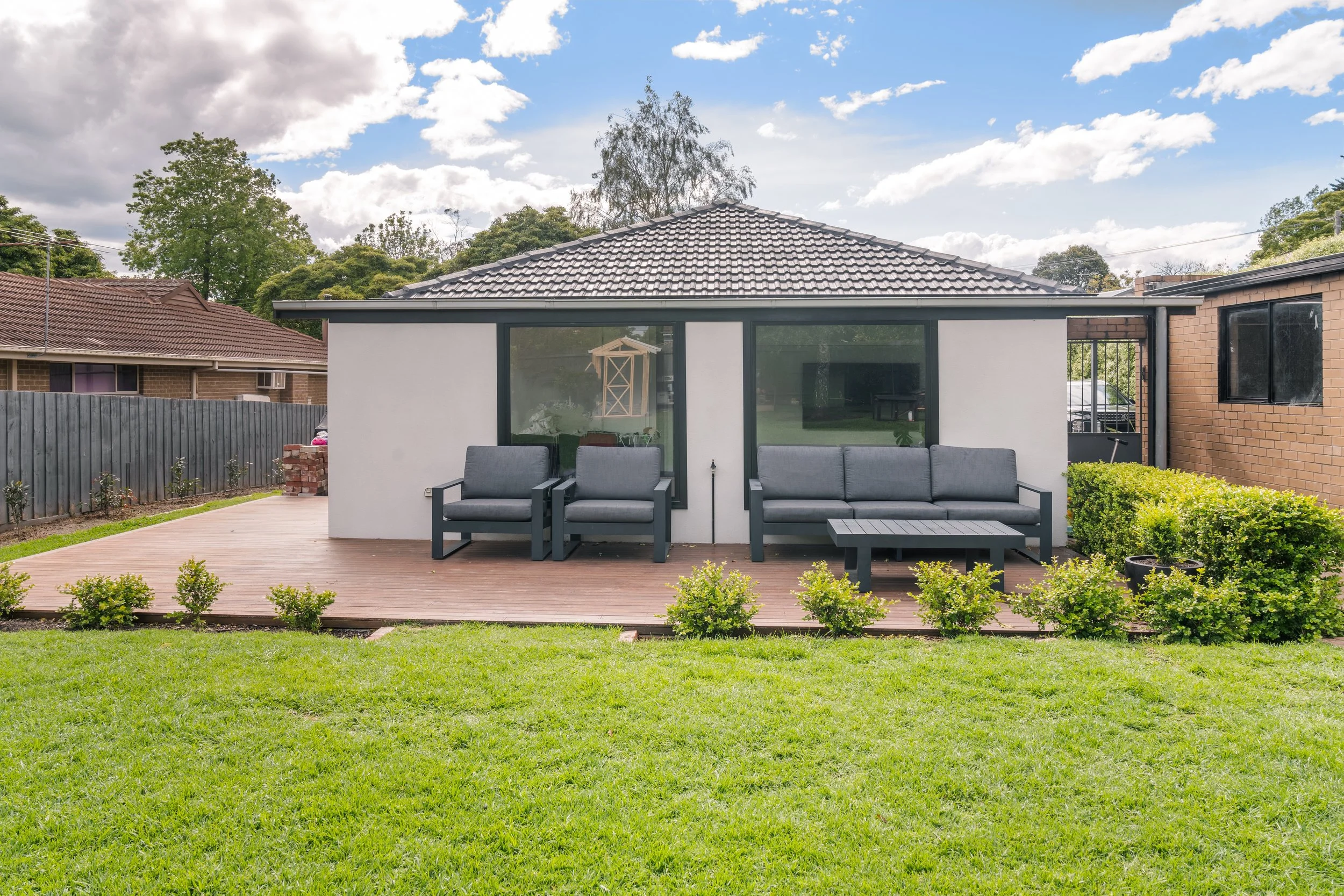 Modern houce backyard with a patio in Yarra Valley built by Leisure Built