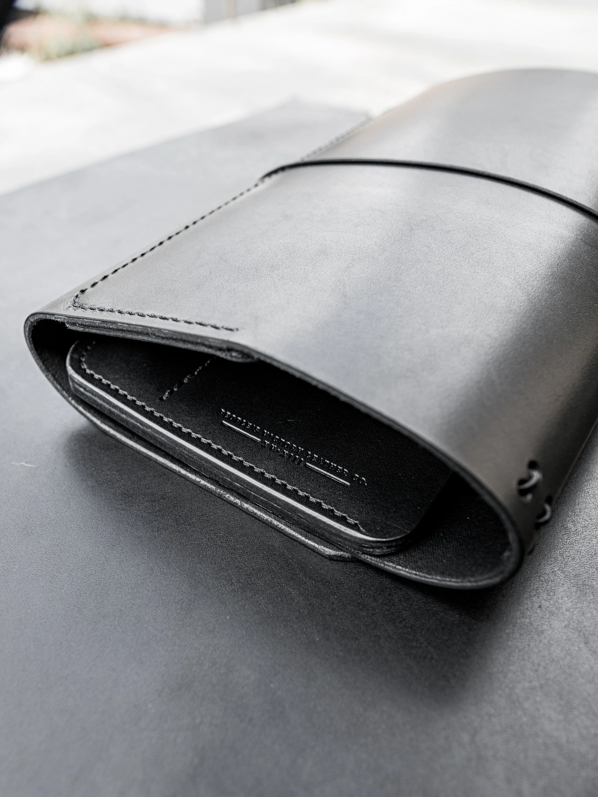 victoria-a5-trifold-black-latigo.jpg
