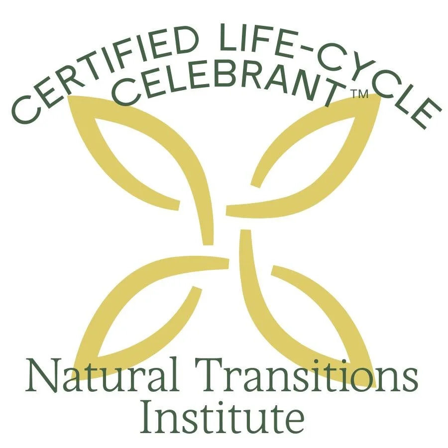 A logo featuring four stylized yellow-green leaves arranged in a cross pattern, with the words "Certified Life-Cycle Celebrant" at the top and "Natural Transitions Institute" at the bottom.