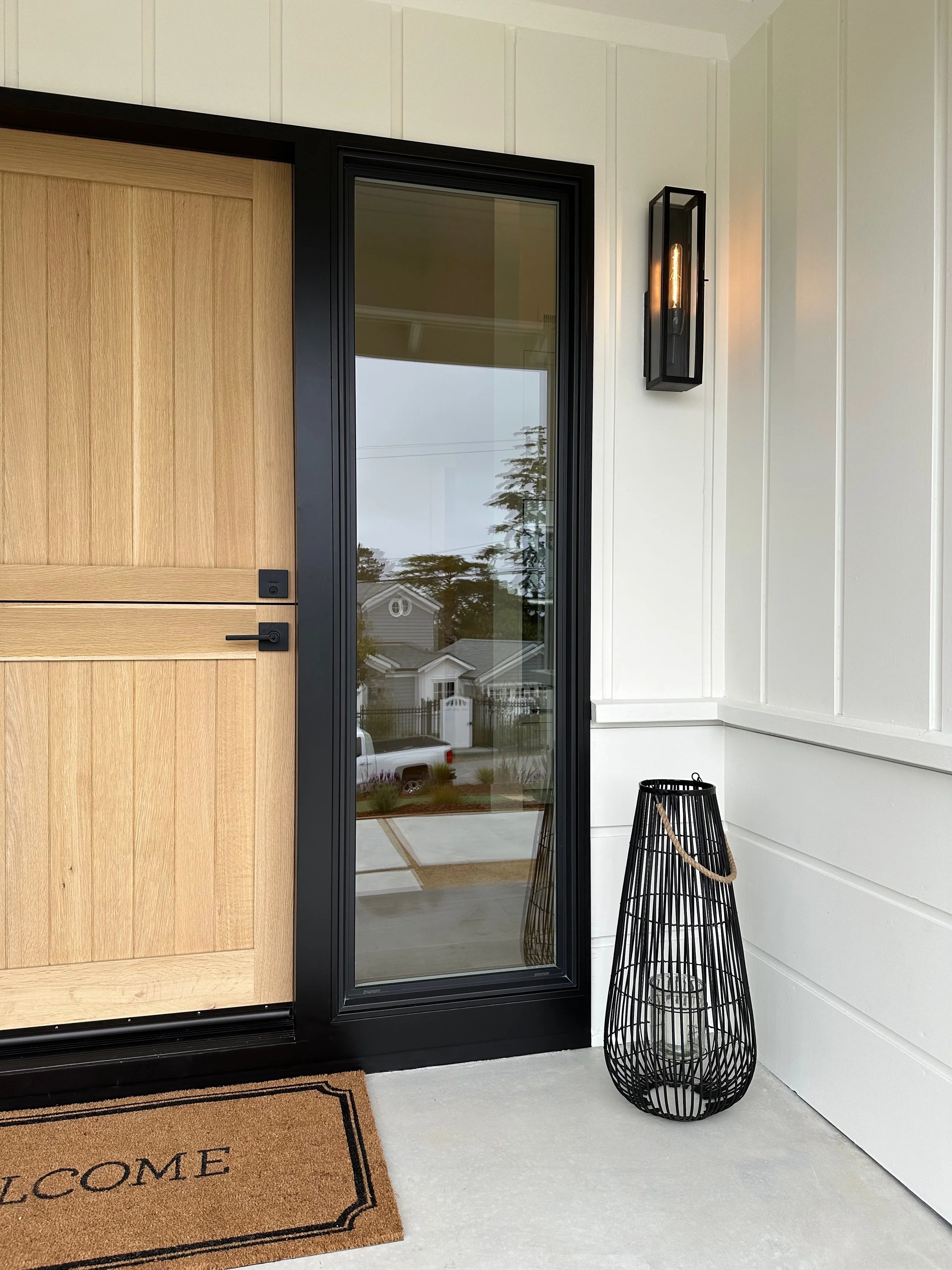 Custom entryway and custom Dutch door with split-opening capability in Monterey California