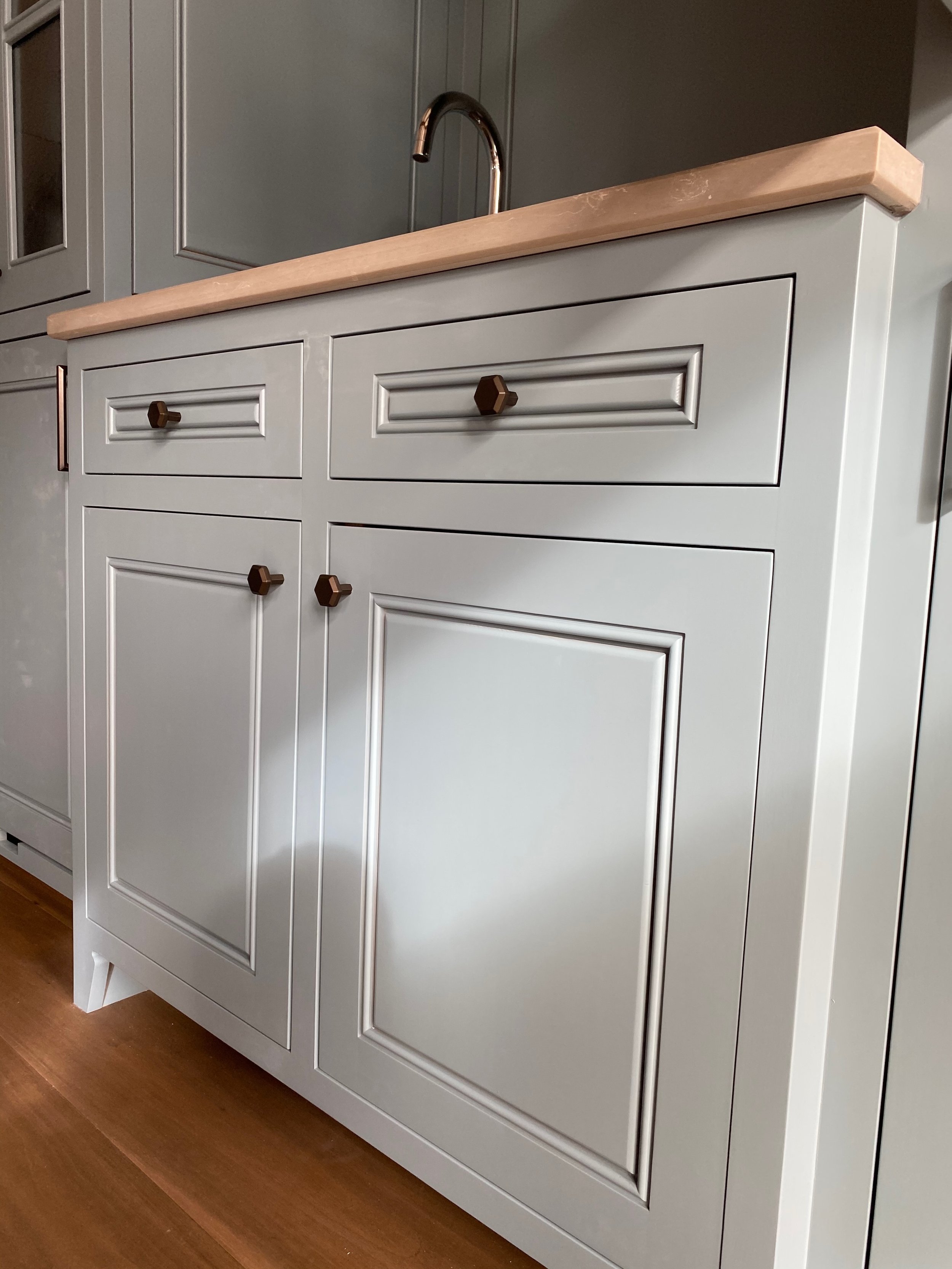 Custom kitchen island with butcher block and sink designed and installed by Valley Mill Shop
