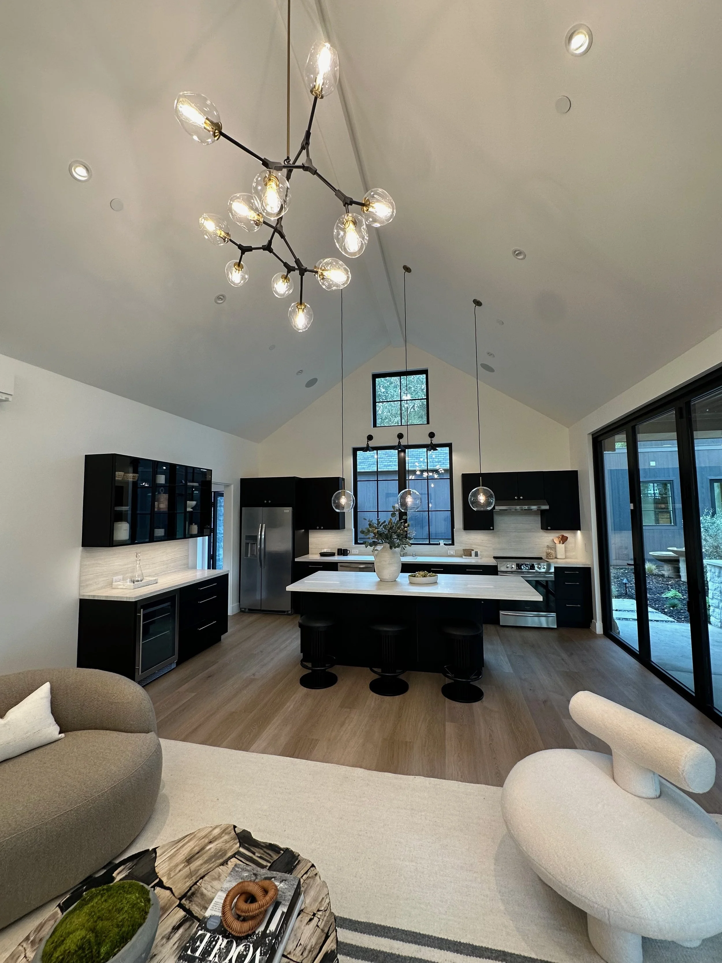 Large custom flooring project in a living room with grey tones in Monterey