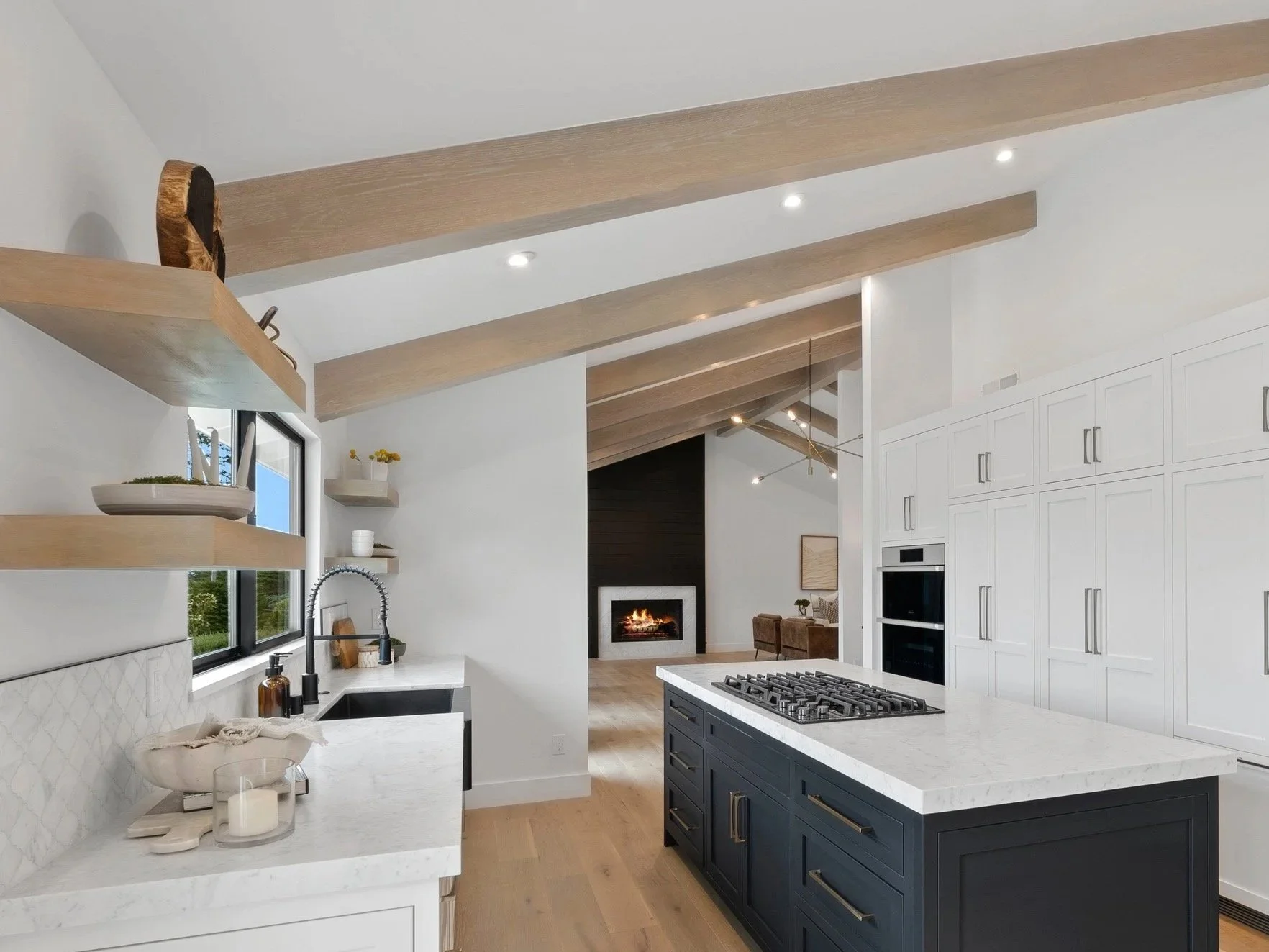 Custom Box Beams throughout a kitchen and living room in a home in Carmel California