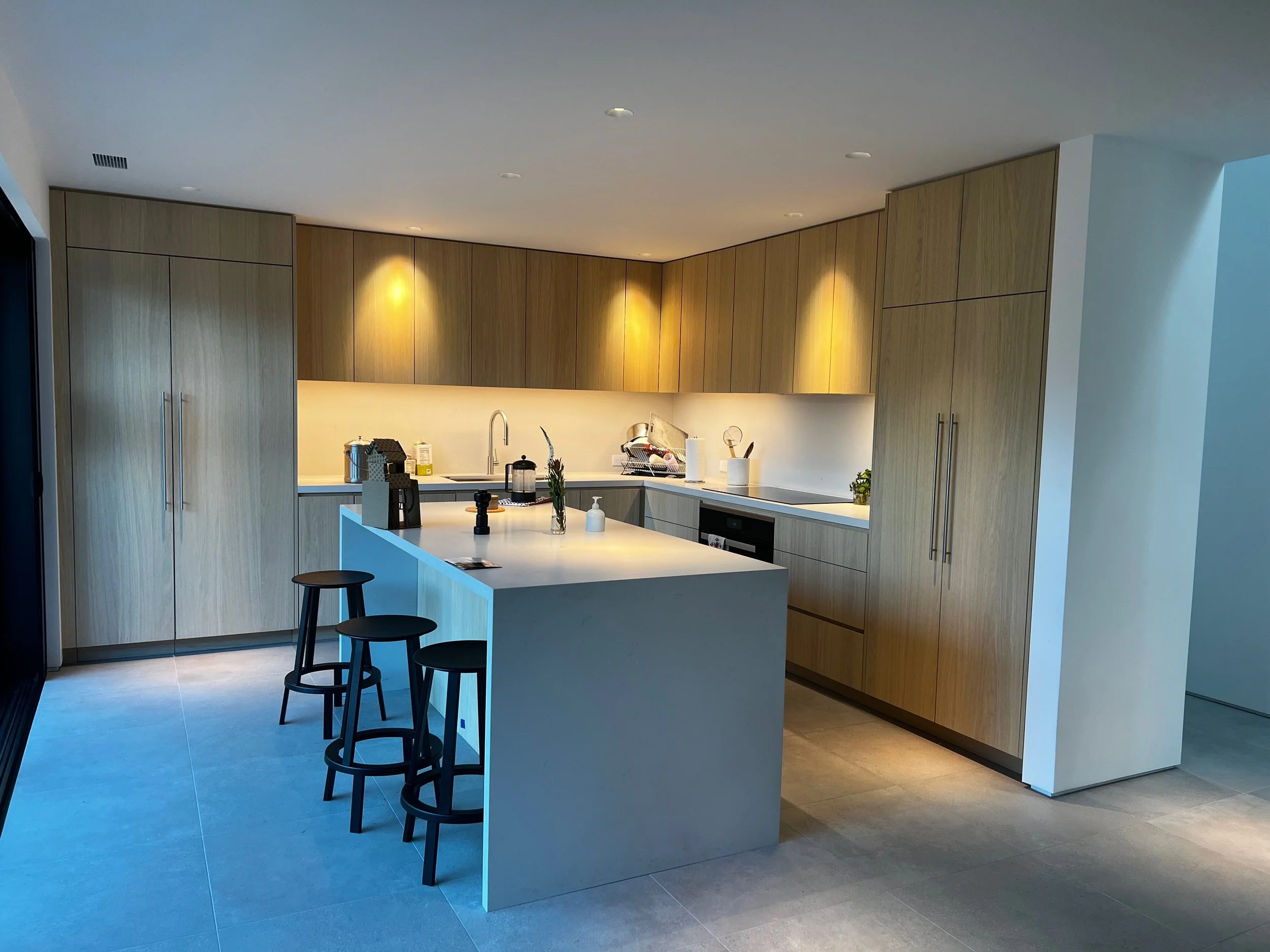 Custom built-in bar and cabinets floor to ceiling design in Monterey California designed by Valley Mill Shop