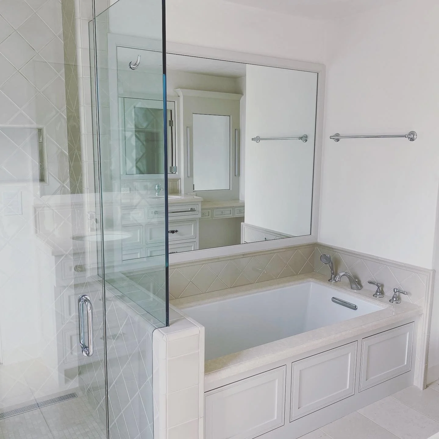 Custom woodwork around a bath tub to highlight wood trim and other features