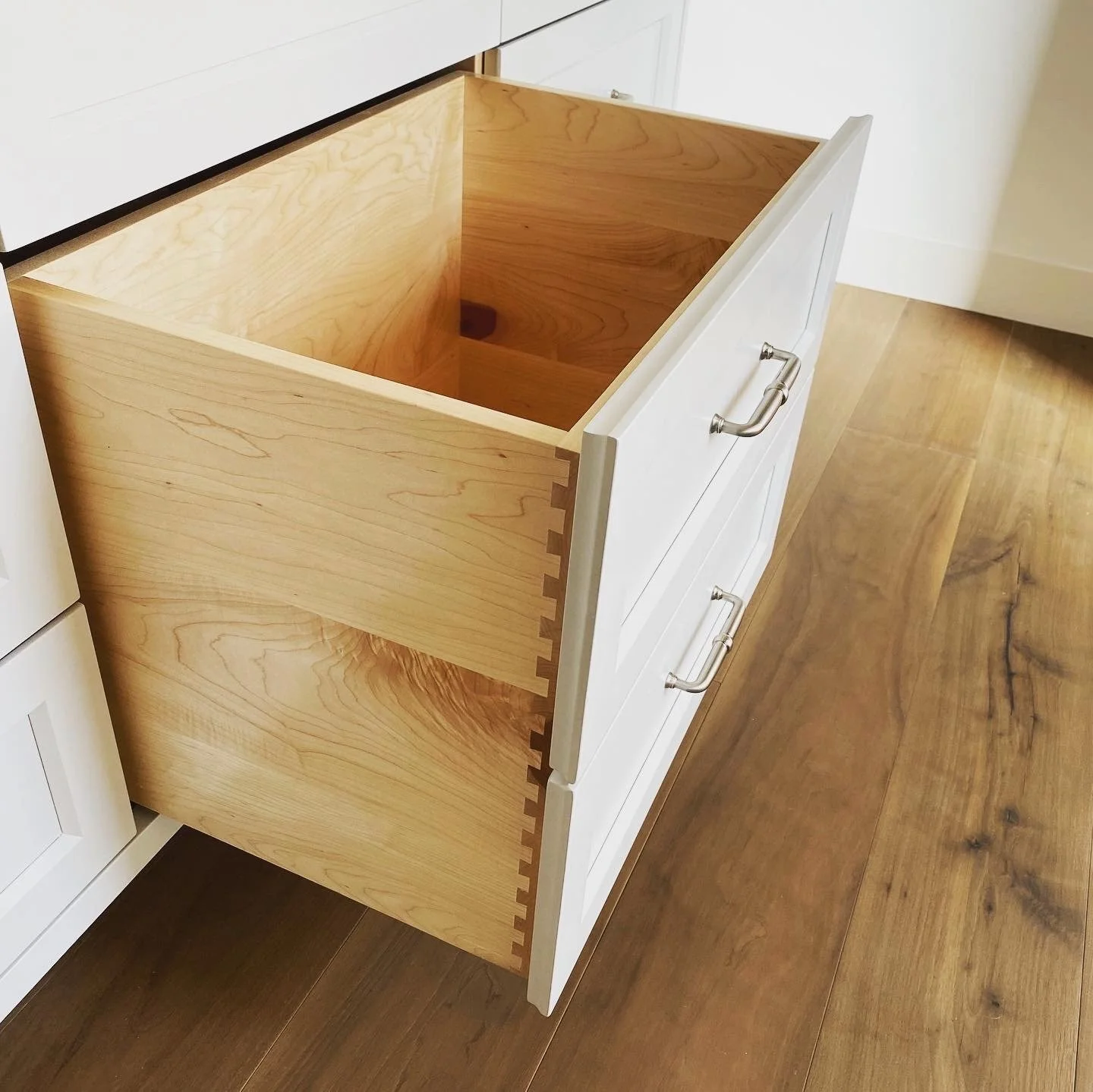 Custom drawers made for custom cabinets with dovetail joining created by Valley Mill Shop