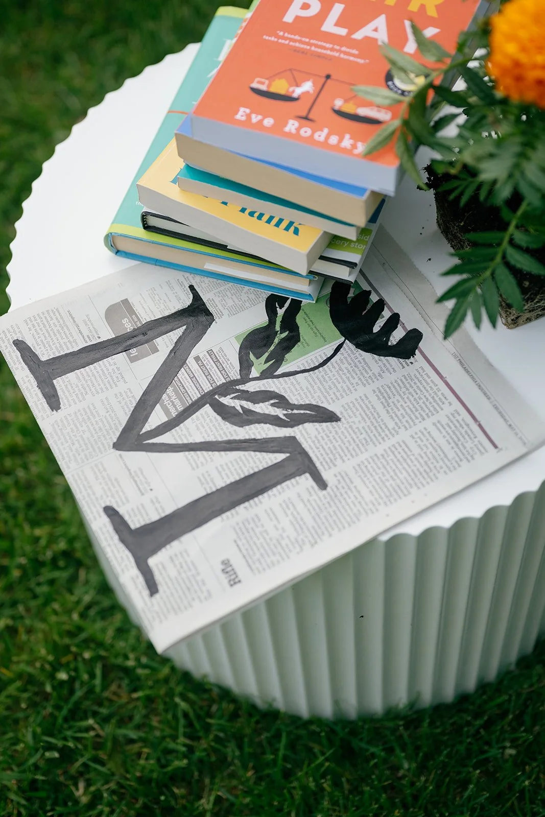 Marigold therapy collective newspaper with books