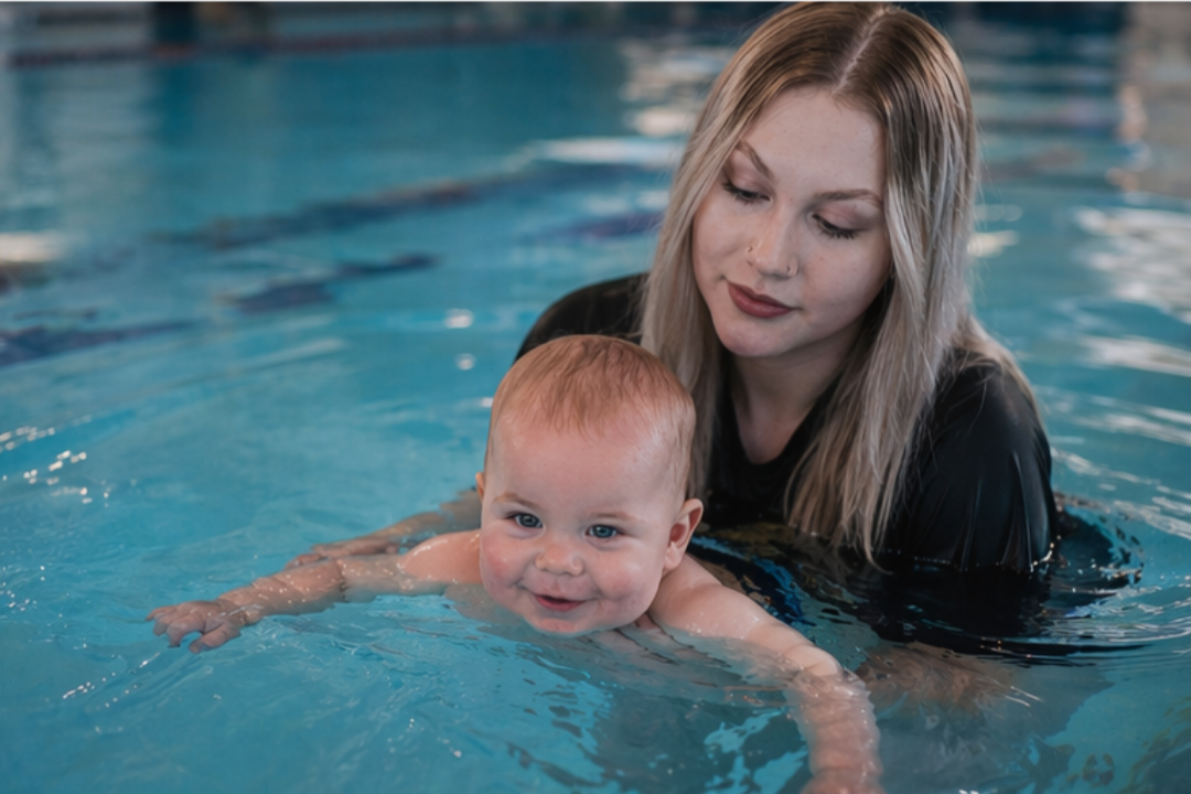 ISS baby and instructor swim lesson