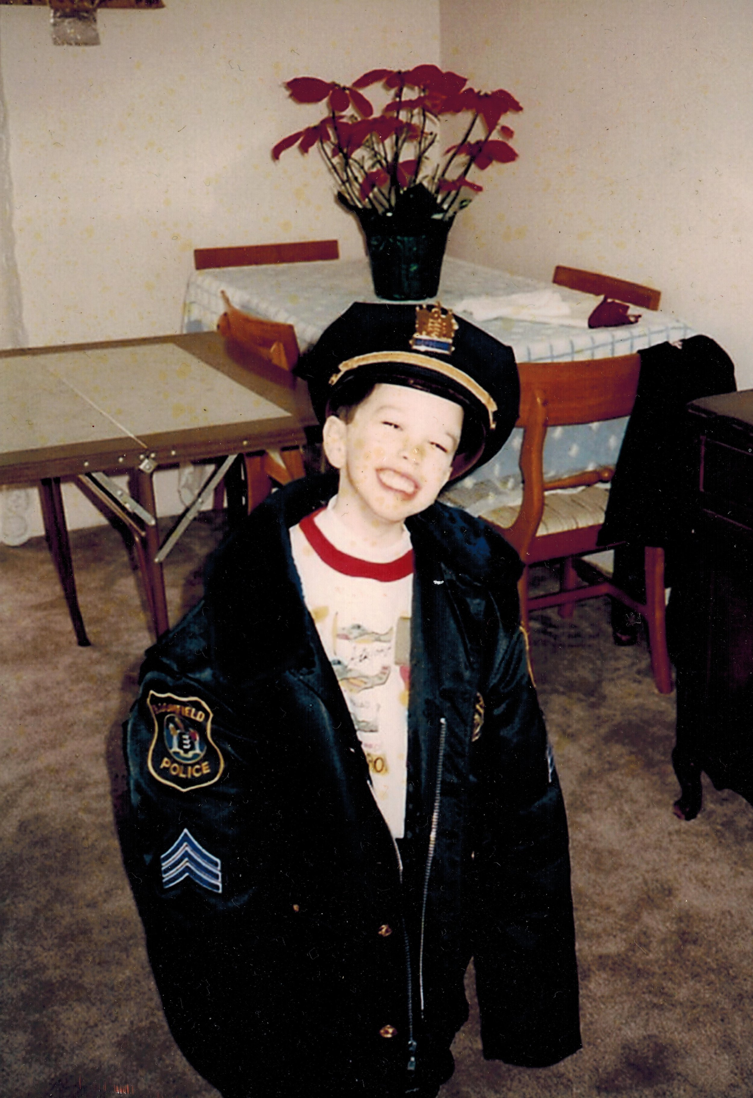 Mike wearing his father's work jacket.