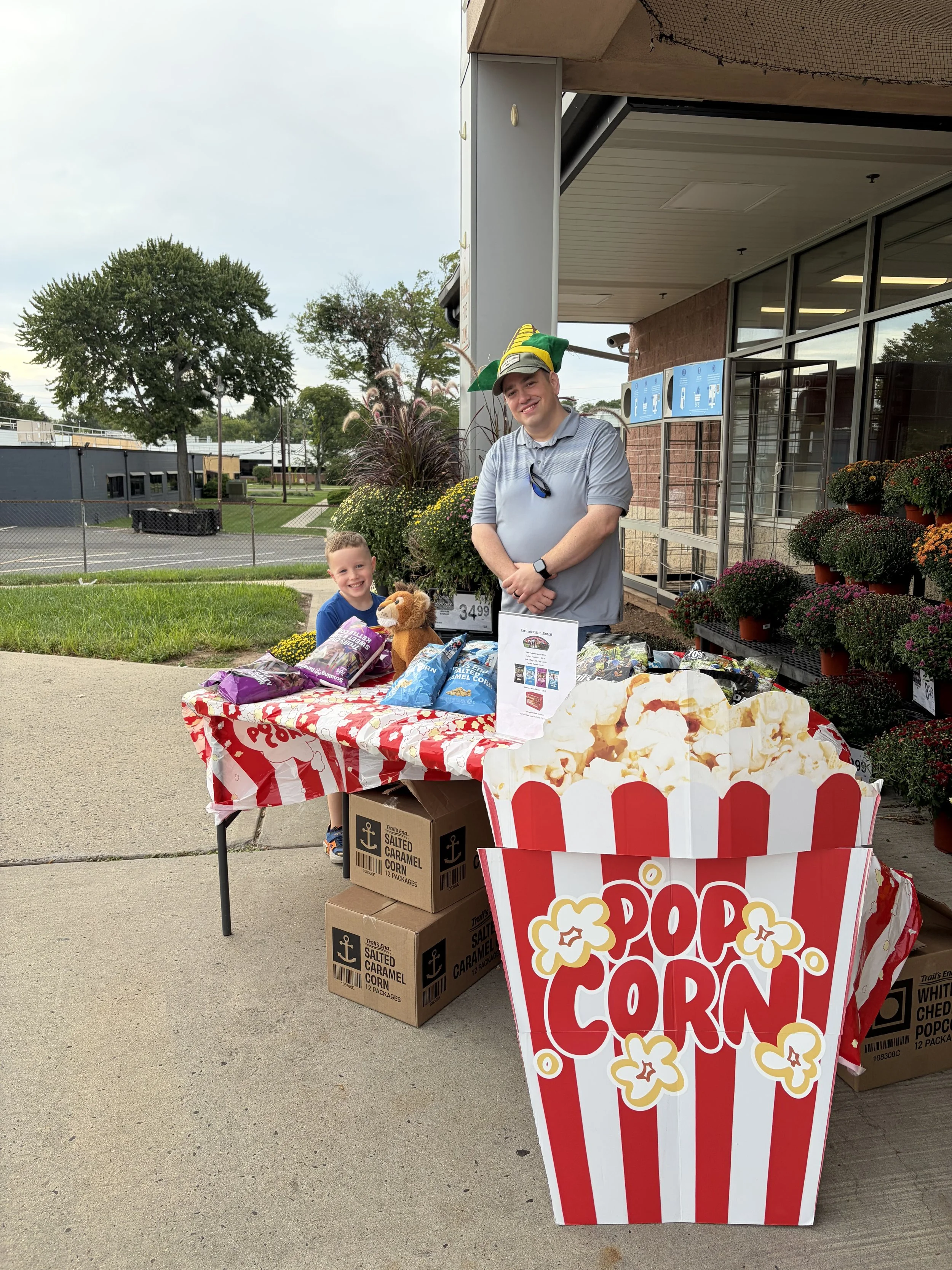 Pack 145 Popcorn Duties with their newest Lion Scout