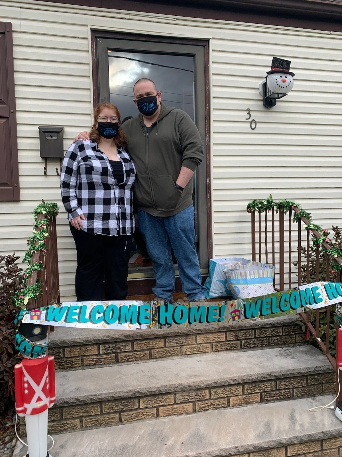 Mike Decker and wife Megan welcoming their child home to Clark, New Jersey.