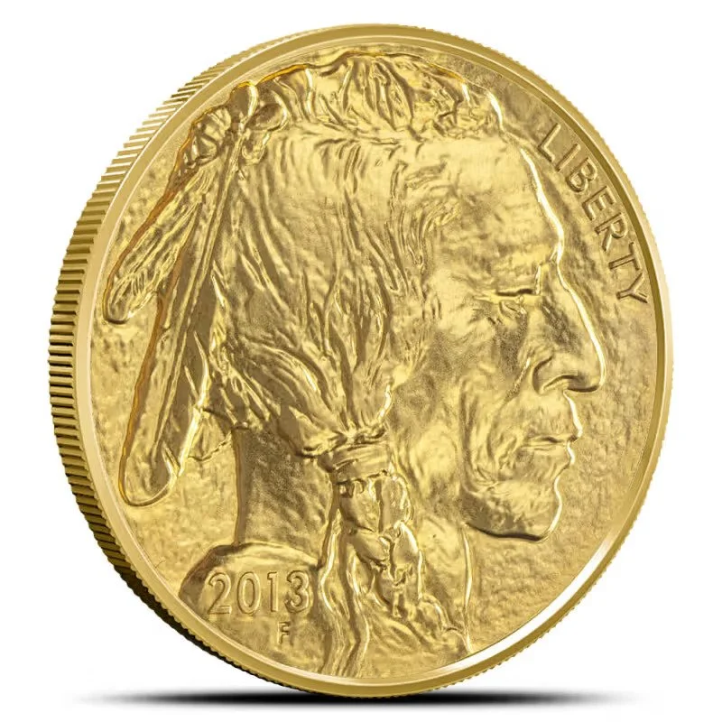 Close-up of a 2013 American gold coin depicting the profile of a Native American man with traditional hairstyle, into the word LIBERTY.
