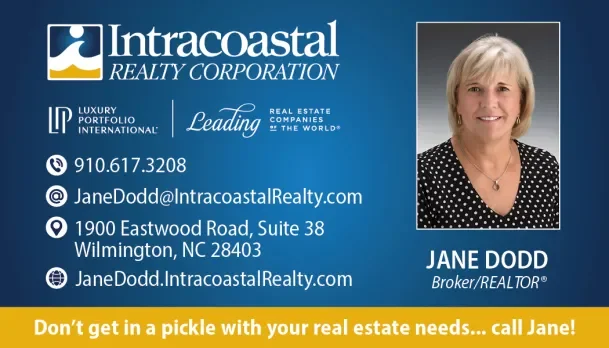 Business card for Jane Dodd from Intracoastal Realty Corporation, featuring her photo, contact information, and a slogan: 'Don't get in a pickle with your real estate needs... call Jane!'