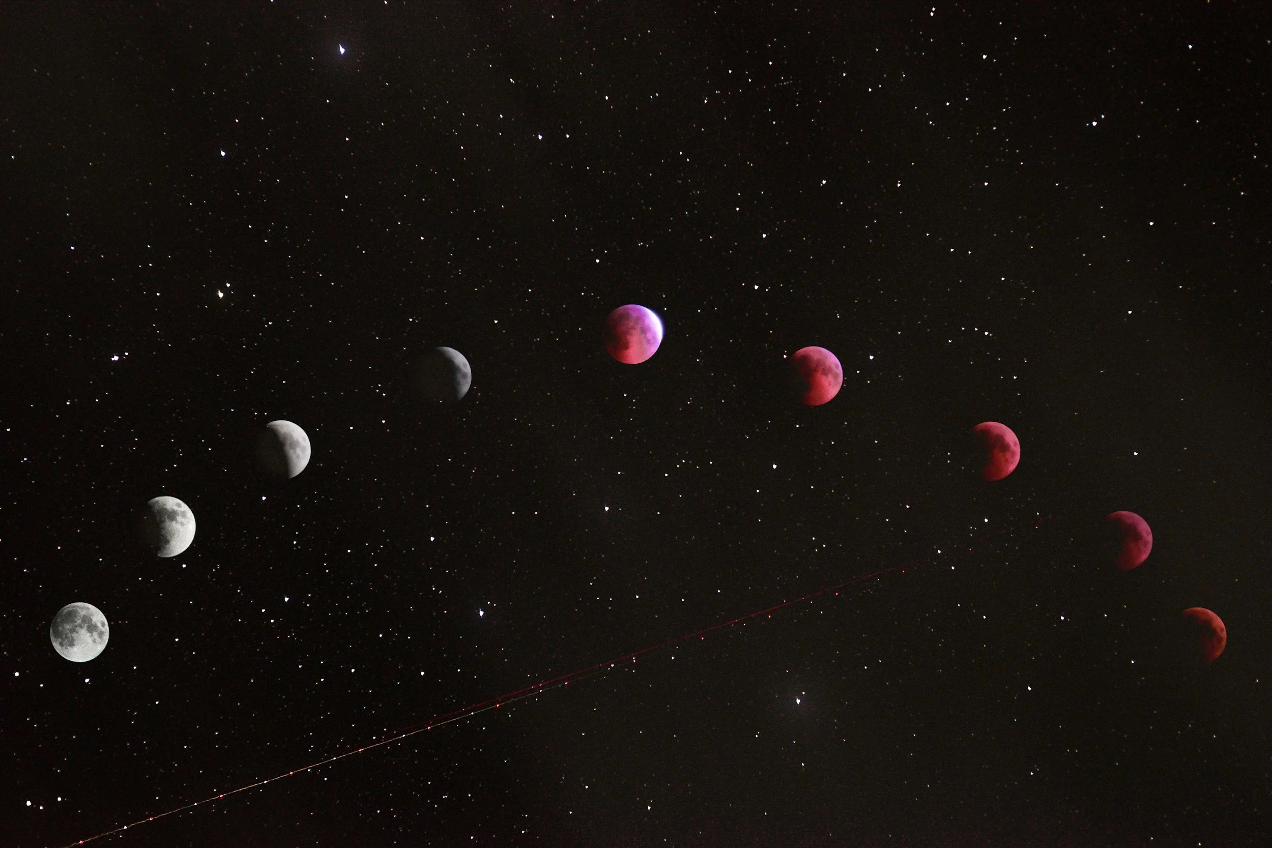 Sequence of lunar phases showing the moon transitioning from full moon to new moon, set against a starry night sky.