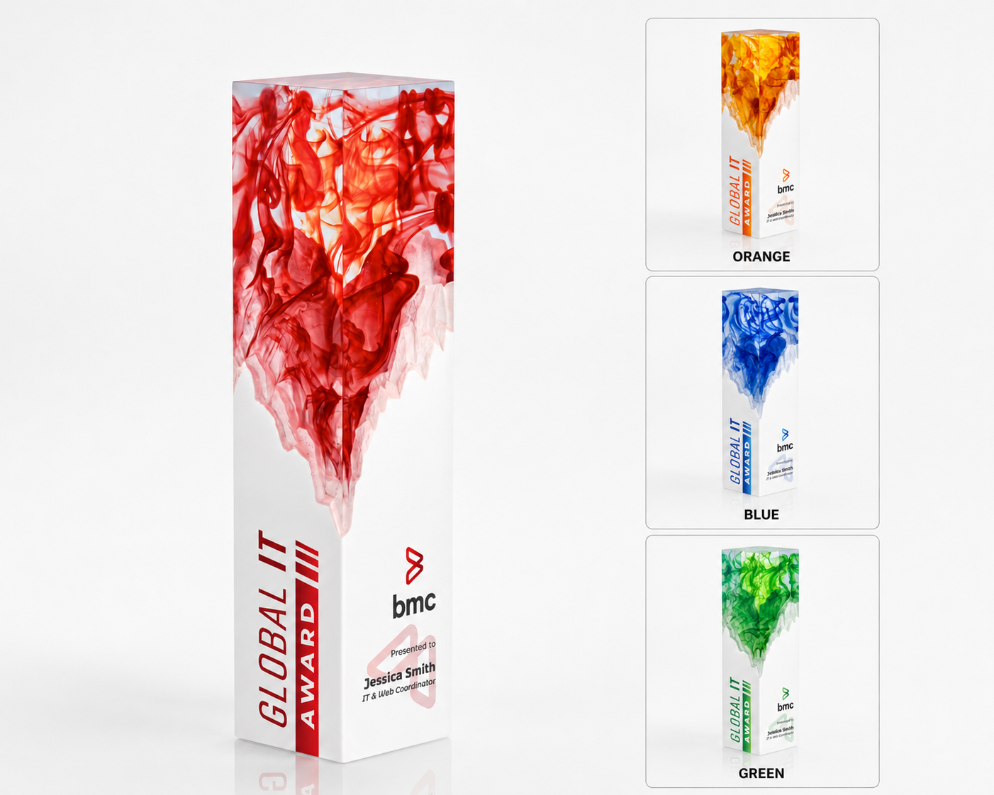 A large rectangular award with a swirling, colorful, red and pink design, labeled "Global IT Award" with the BMC logo and a personalized name plaque. To the right, three smaller images show the award in orange, blue, and green colors.